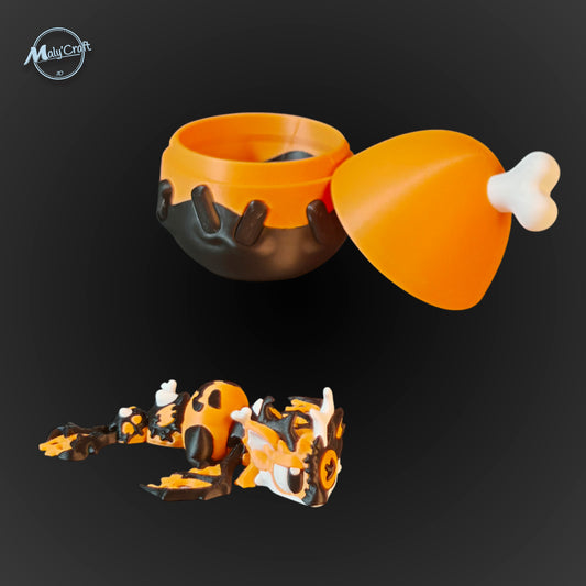 Figurine dragon articulé Halloween orange et noir sortant de son œuf surprise, impression 3D en PLA Made in France.