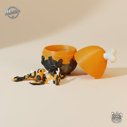 Figurine dragon articulé Halloween orange et noir sortant de son œuf surprise, impression 3D en PLA Made in France.