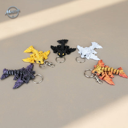 Ces figurines dragons porte-clés prennent vie avec leurs articulations mobiles. Chaque design évoque un univers magique – parfait pour les fans de fantasy, de Wings of Fire, Donjons & Dragons, ou de How to Train Your Dragon. À collectionner ou offrir