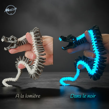 Dragon articulé blanc et bleu – effet lumineux à la lumière et dans le noir.