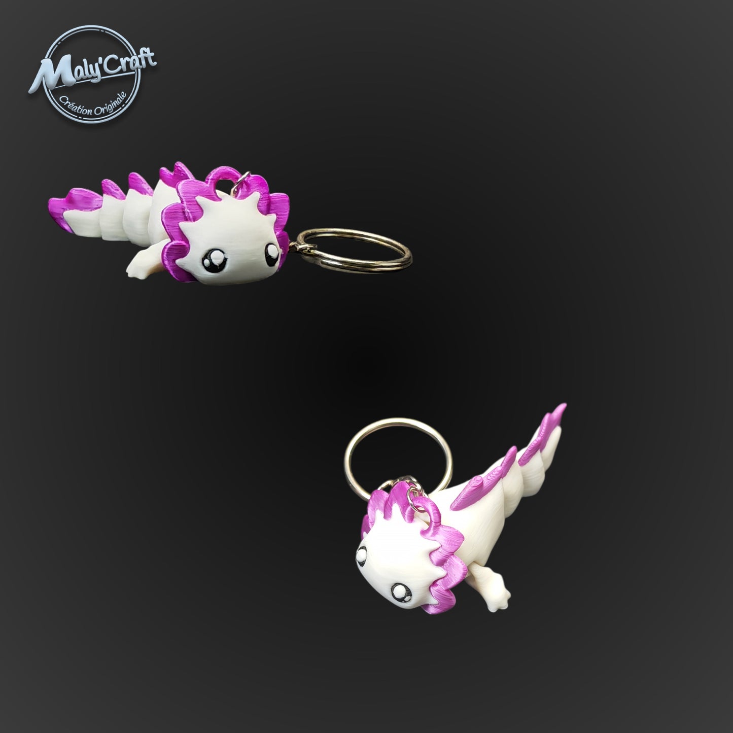 Zoom sur deux axolotls violet et blanc, soulignant la douceur des formes et la qualité de l'impression 3D