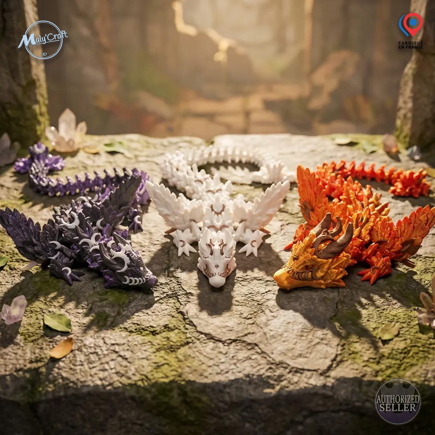 Mise en scène fantasy de dragons articulés Cinderwing avec cristaux. Figurines de collection bicolores imprimées en 3D. L'image affiche les badges de garantie : Fabriqué en France et Vendeur Autorisé Maly'Craft.