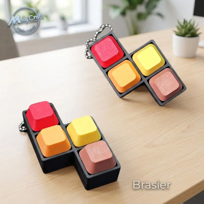 Porte-clé fidget clicker modèle Brasier aux tons rouge, jaune et orange. Impression 3D haute précision réalisée en France avec filament mat Sunlu. Texture lisse et retour tactile mécanique net. Conception robuste en acide polylactique pour une durabilité accrue.