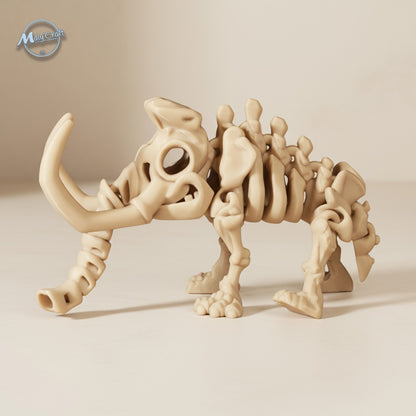 Figurine articulée de mammouth fossile imprimée en 3D sous licence Flexi Factory, finition beige mate. Impression soignée par Maly’Craft en France.