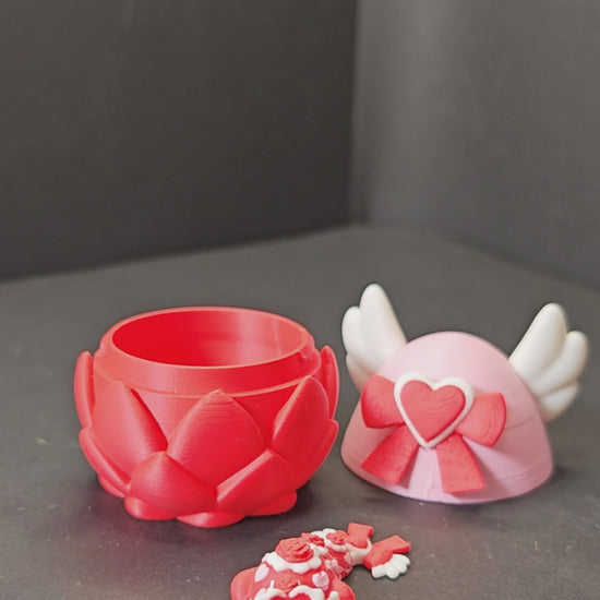 Vidéo de démonstration du dragon articulé 3D Gob : manipulation des articulations fluides et présentation de l'œuf de la Saint-Valentin.